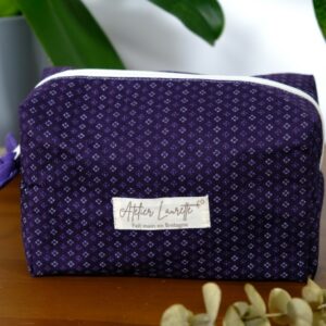 Trousse de toilette petit format violette à motifs losanges